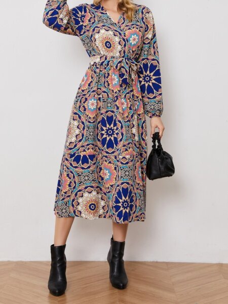 Floral print V-neck long sleeve waist tied dress.